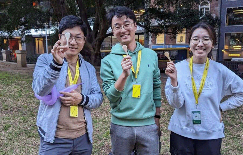 Team celebrating winning the wooden spoon at the end of the Sydney Amazing Race