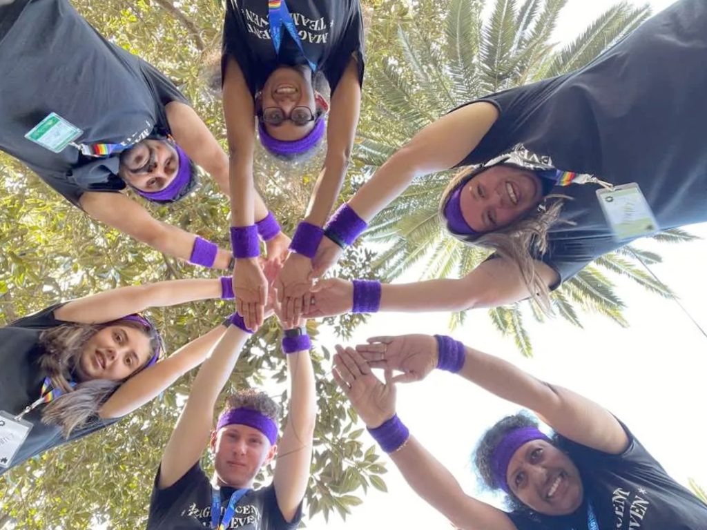 Team building activities in Australia – corporate group enjoying a fun team bonding challenge outdoors