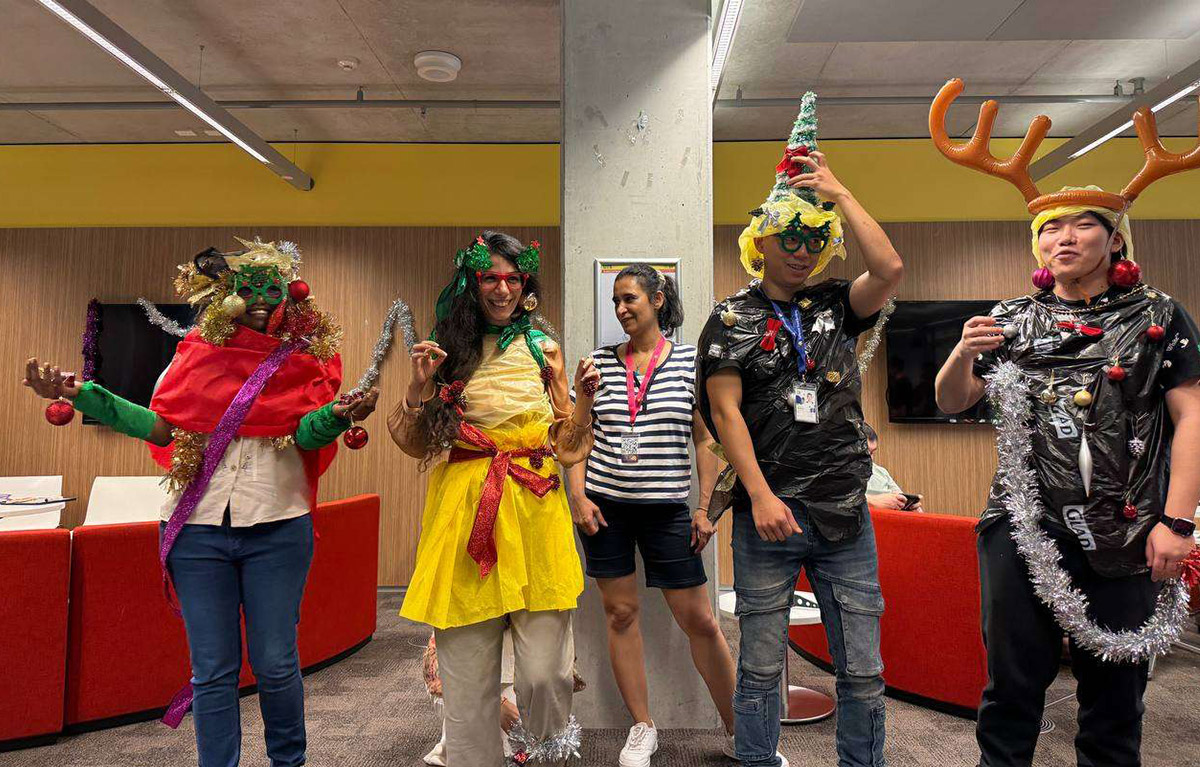 Indoor team bonding game show event with corporate employees