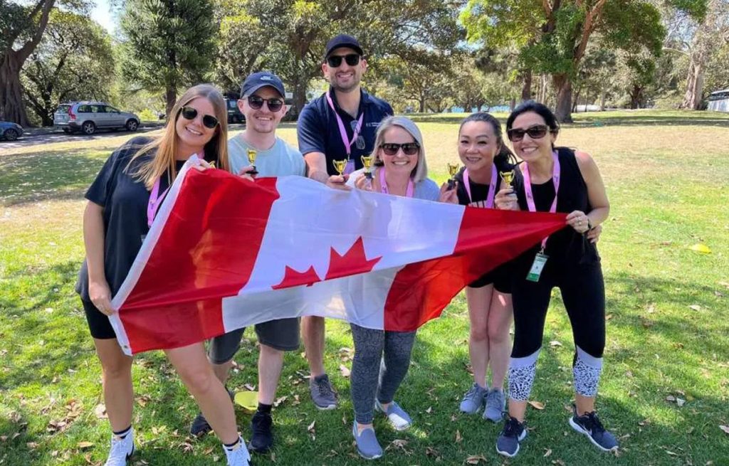 Team completing a challenge during Corporate Amazing Race team building activity