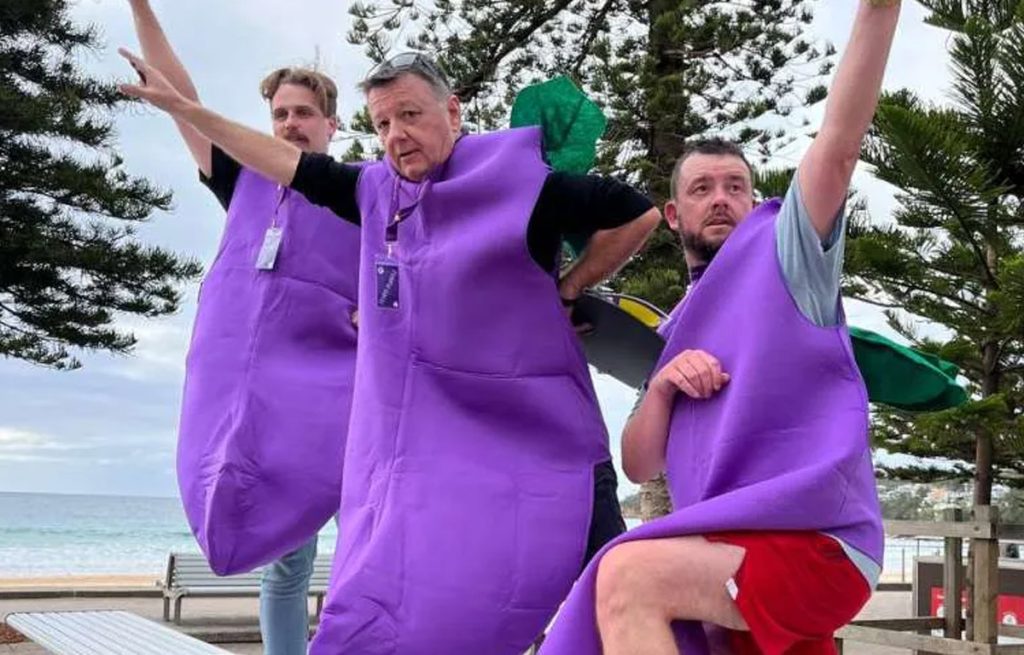 Team completing a challenge during Corporate Amazing Race team building activity