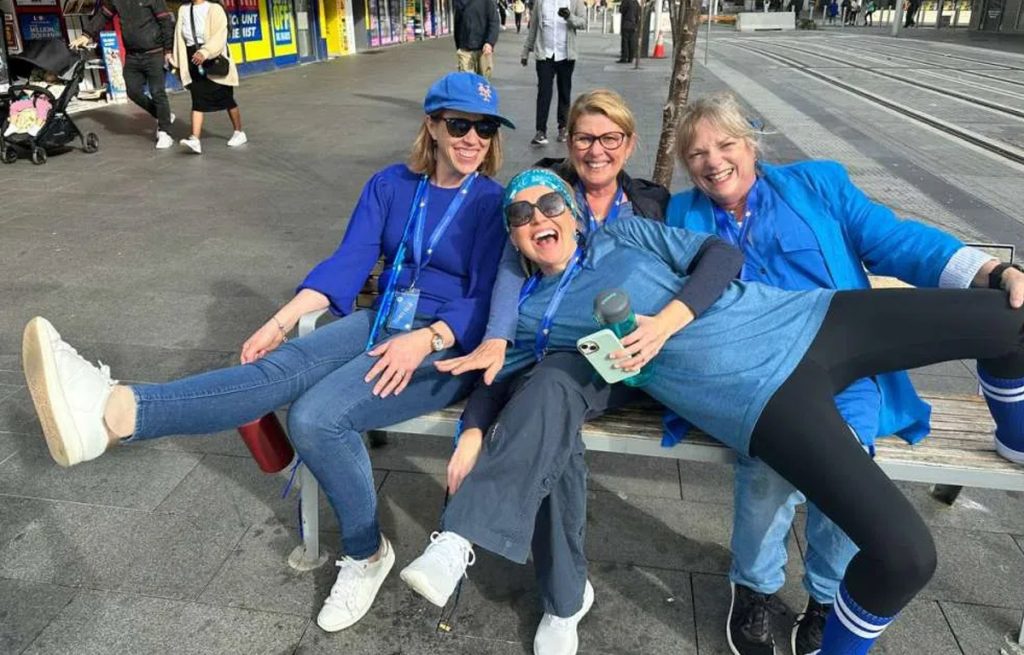 Corporate group enjoying outdoor team building activities together