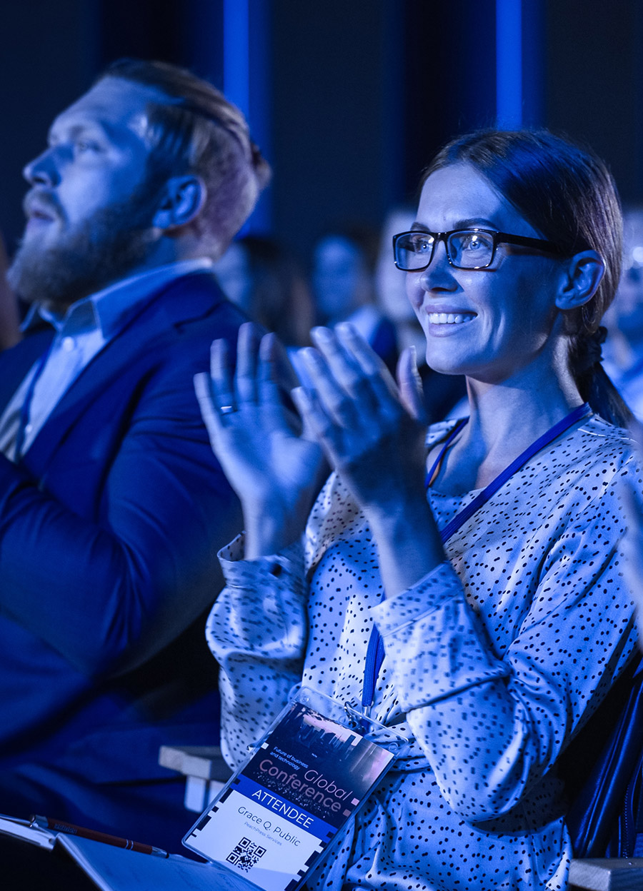 Tailored conference setup with branded signage and modern styling