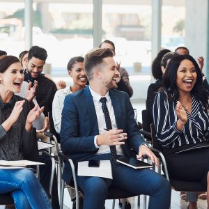 Tailored conference setup with branded signage and modern styling