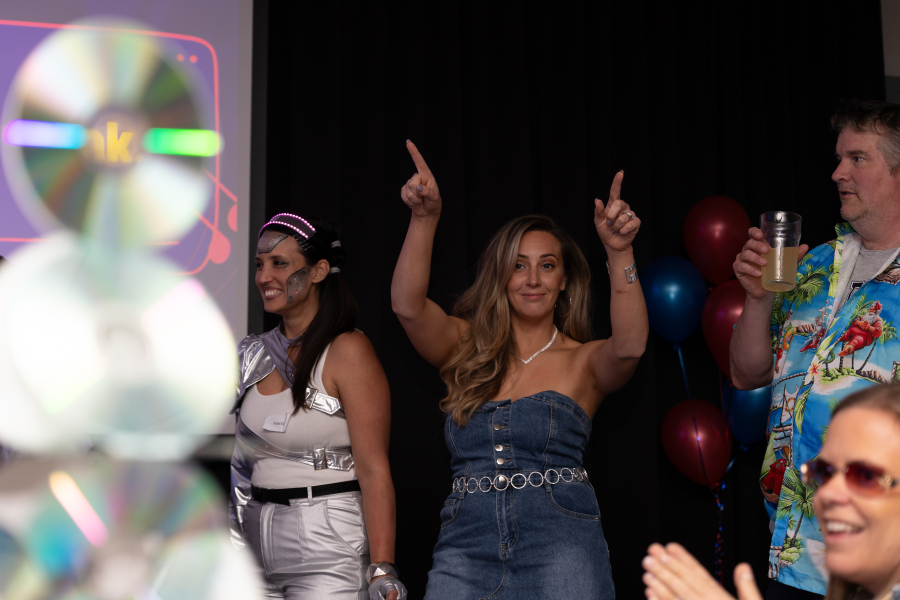 Corporate quiz night team building activity with staff competing in trivia