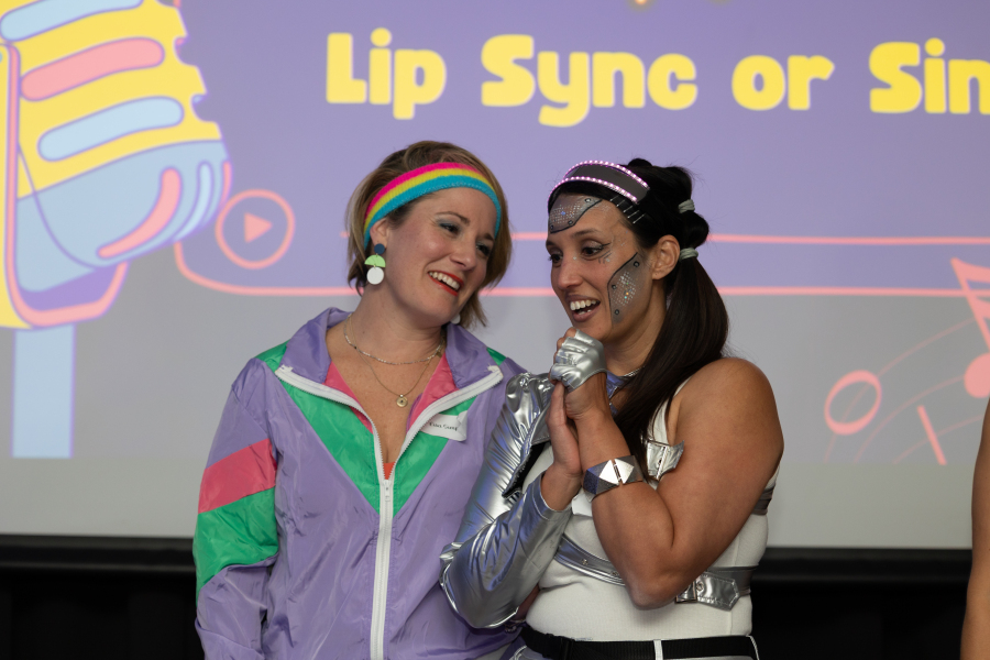 Corporate quiz night team building activity with staff competing in trivia