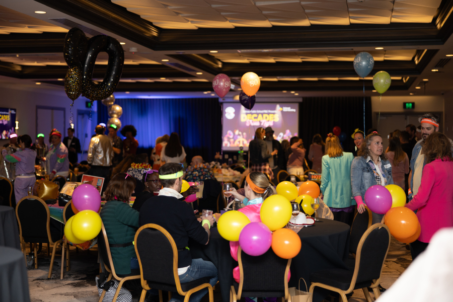 Corporate staff participating in a fun, competitive quiz night activity