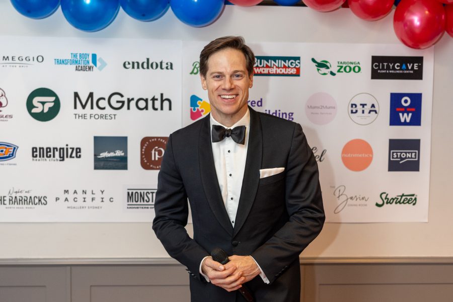 Corporate team building event with quiz master hosting trivia rounds