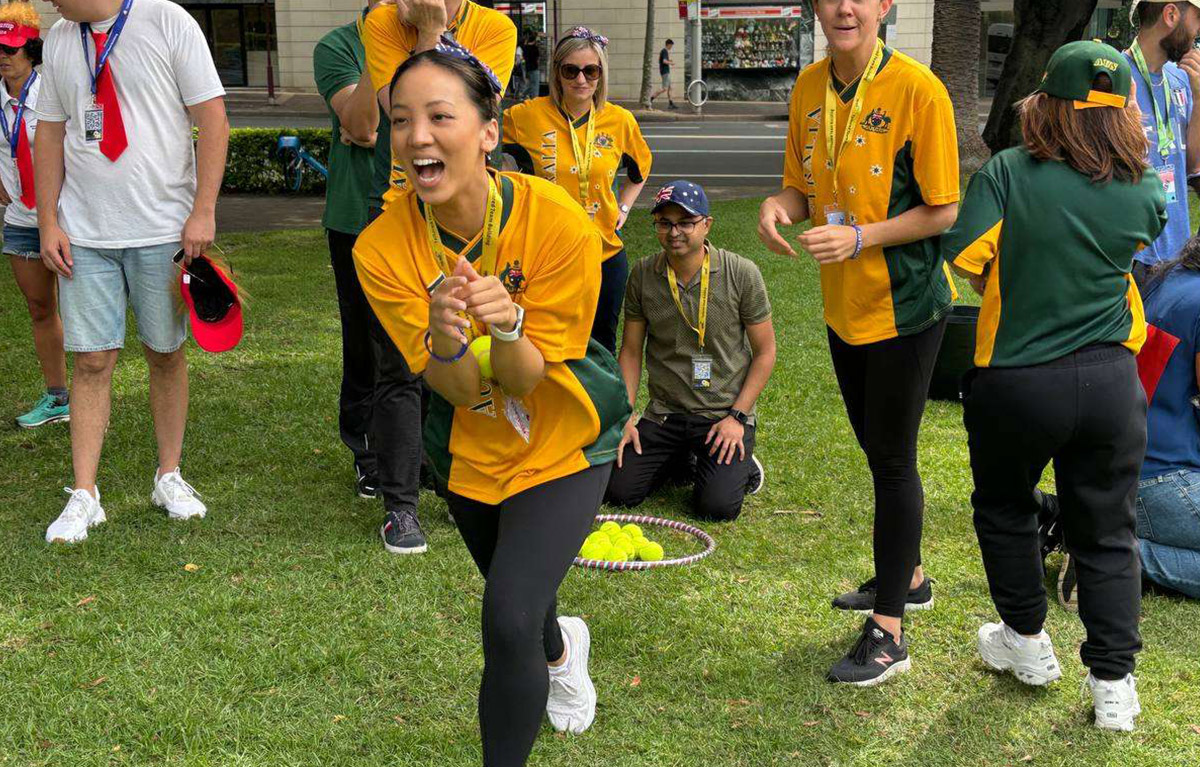 Teams competing in olympic style challenges for a team bonding day