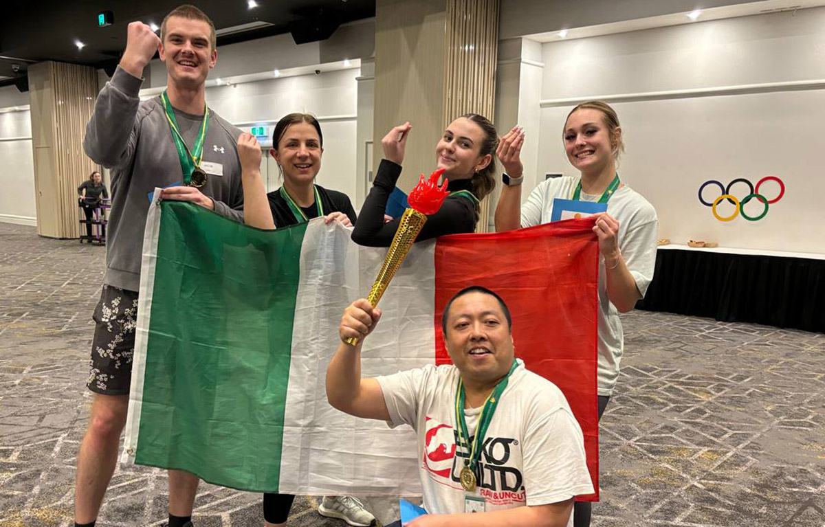 Teams competing in olympic style challenges for a team bonding day