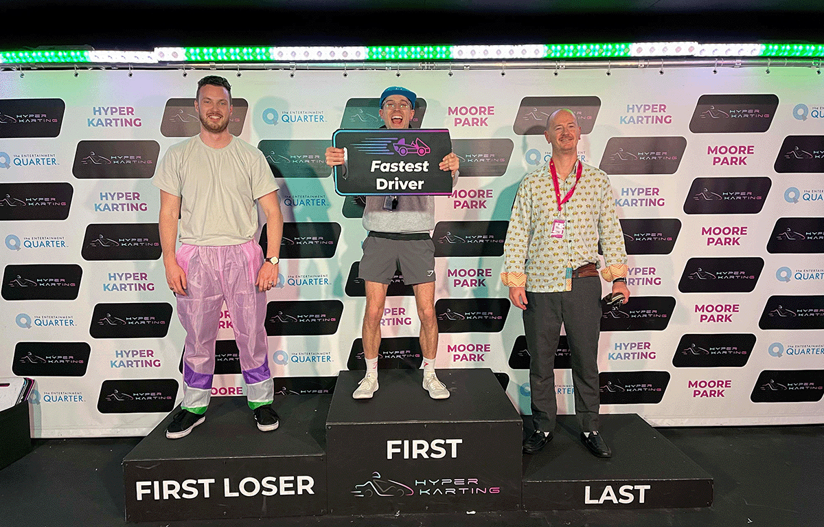 Group of employees participating in a fun team bonding challenge