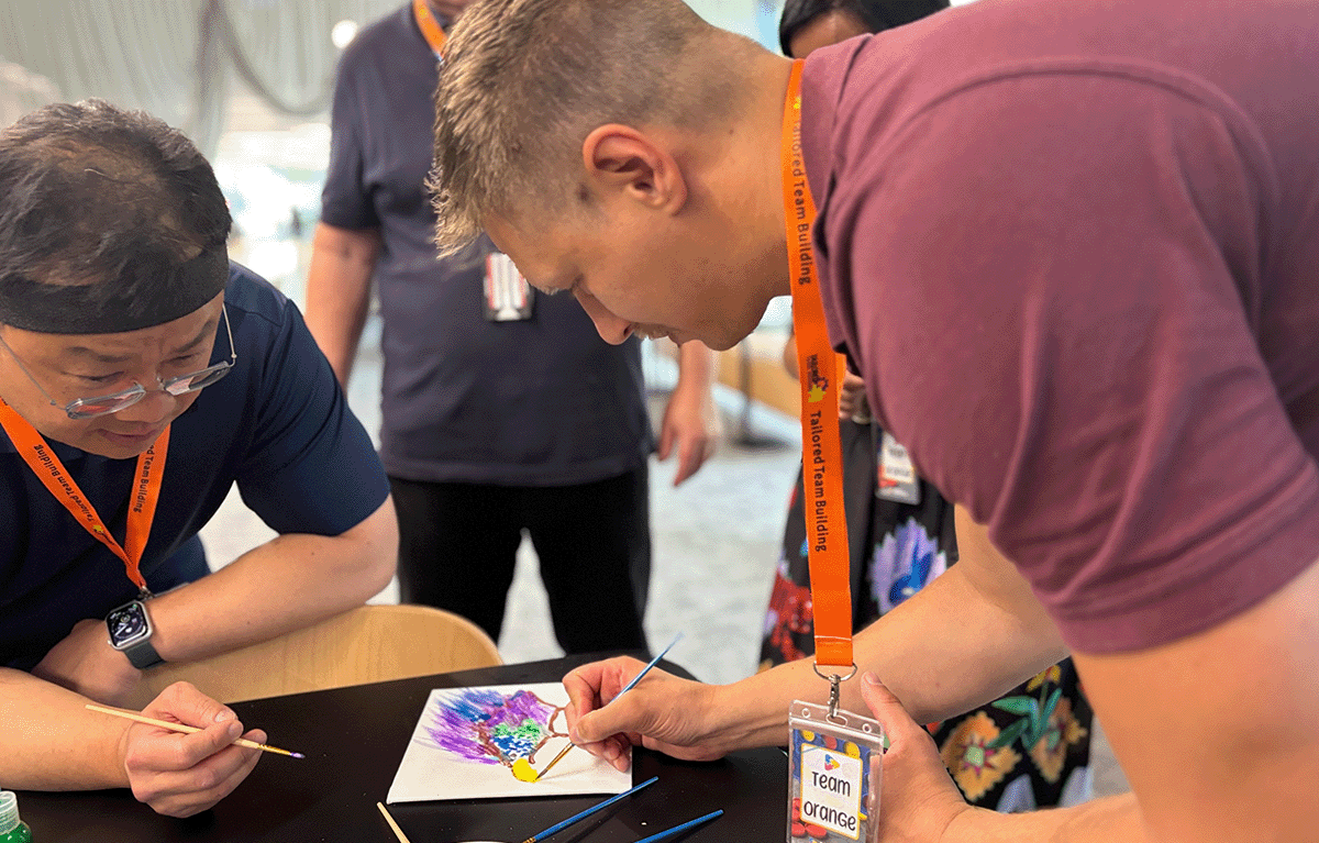 Teams enjoying a fun indoor team building day in Melbourne