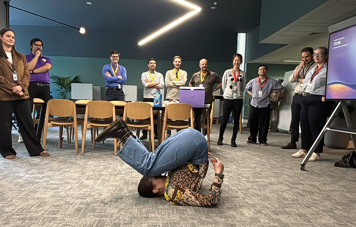 Teams enjoying a fun indoor team building day in Melbourne