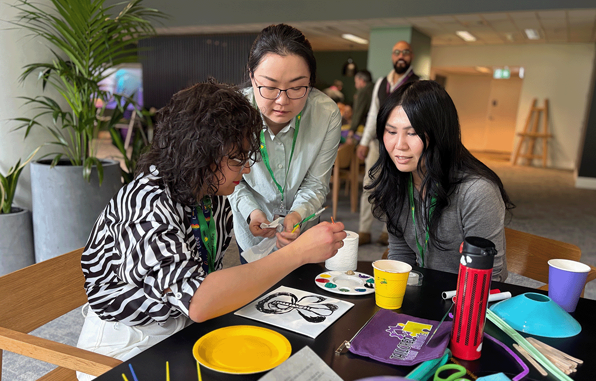 Teams enjoying a fun indoor team building day in Melbourne