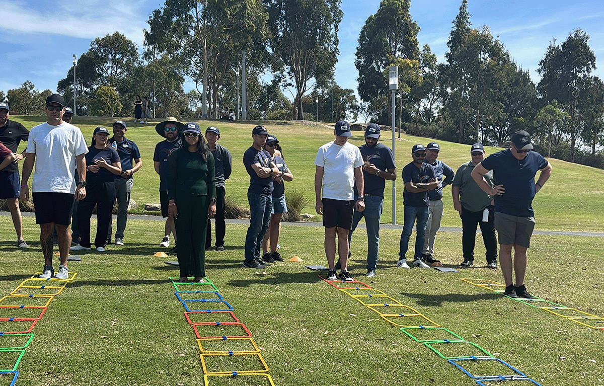 Teams having fun during an outdoor squid games team building activity