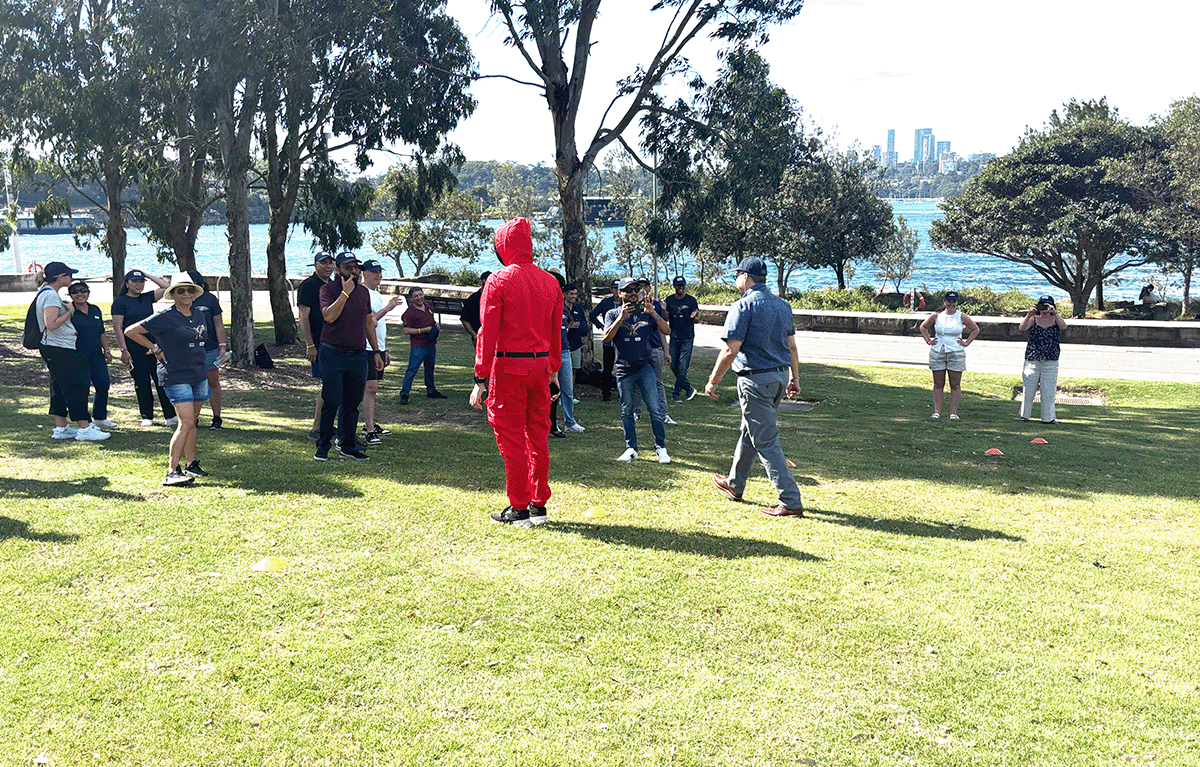 Teams having fun during an outdoor squid games team building activity