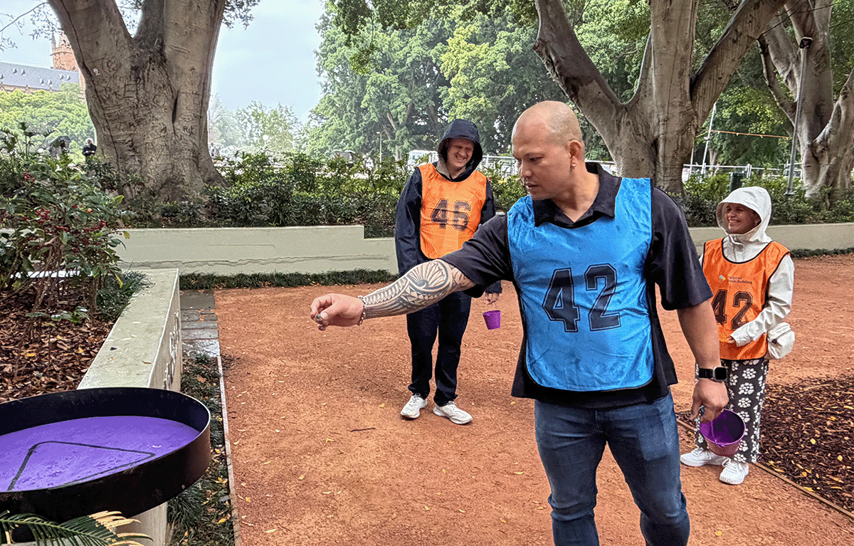 Teams competing in a Squid Games–style challenge during a corporate team building event