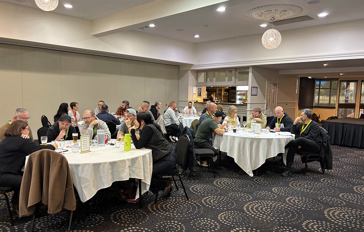 Tailored Team Building hosts leading a fun indoor team building event in Bendigo