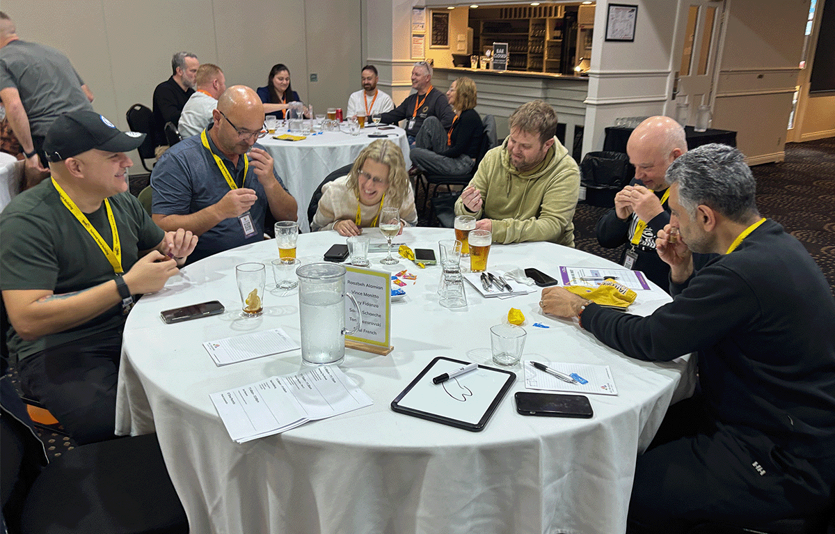 Employees participating in a Tailored Team Building game show event in Bendigo