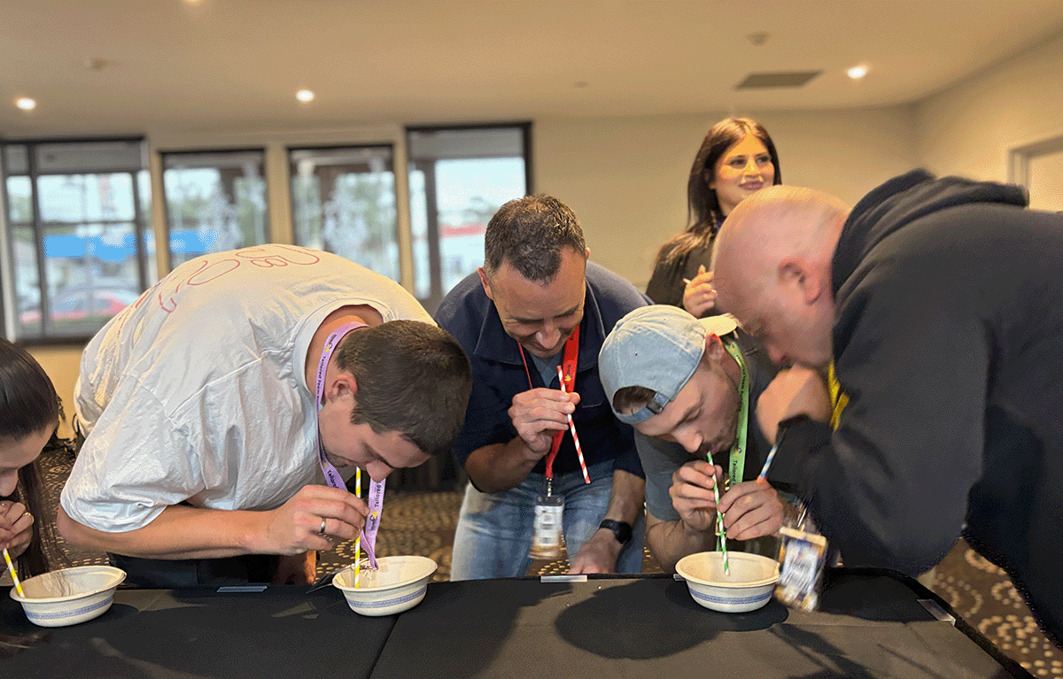 Tailored Team Building hosts leading a fun indoor team building event in Bendigo
