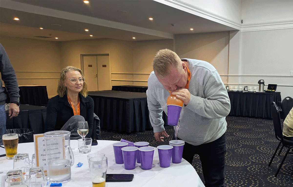 Employees participating in a Tailored Team Building game show event in Bendigo