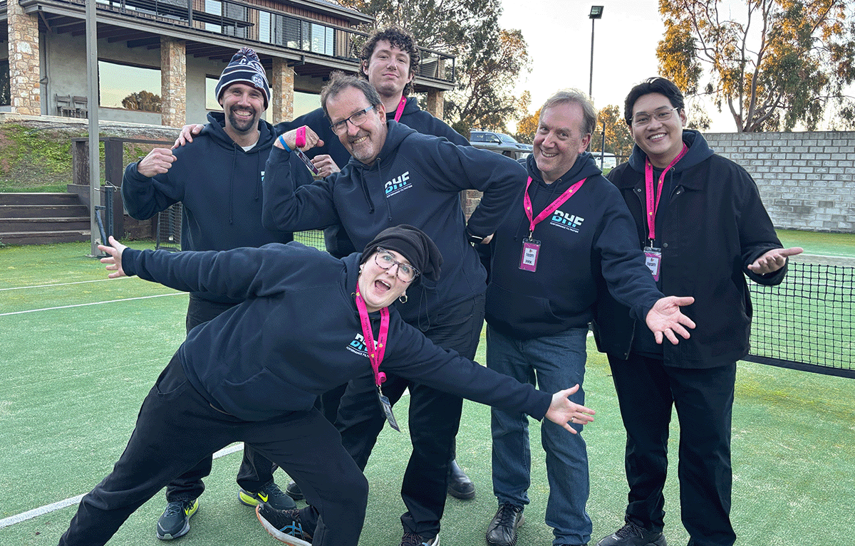 Employees taking part in outdoor Survivor-style team building activities in Nagambie.