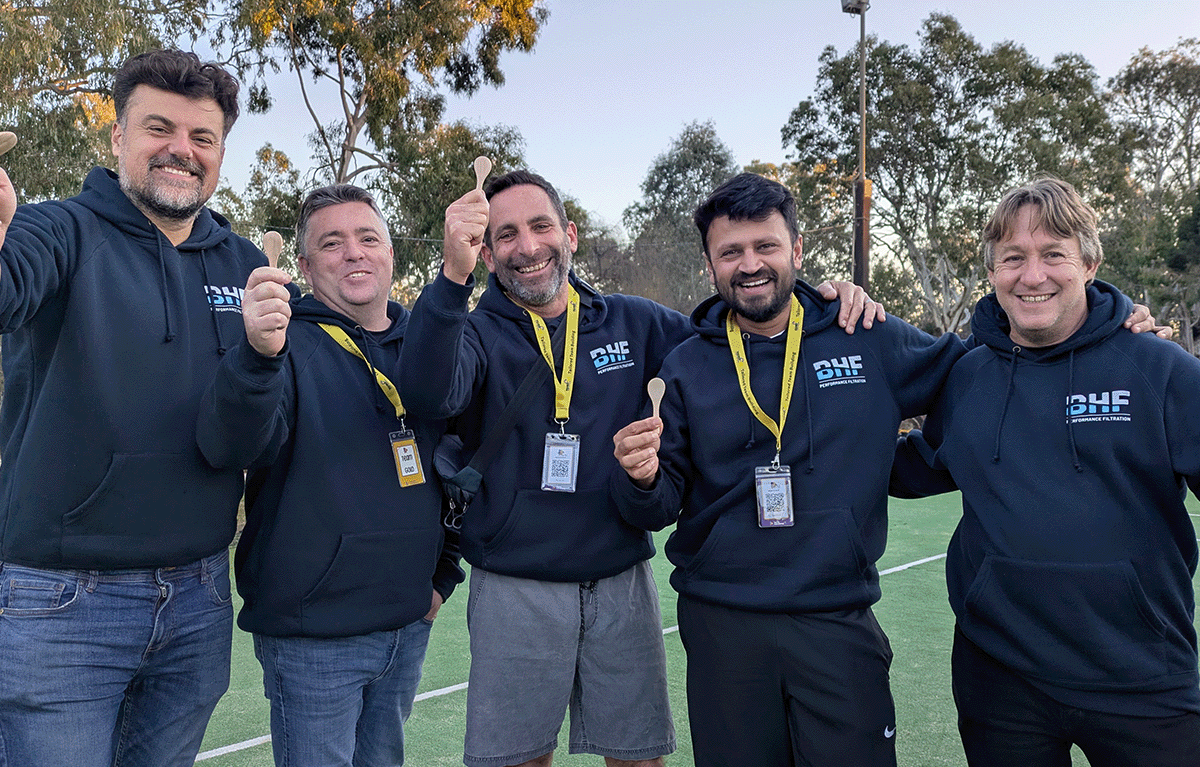 Employees taking part in outdoor Survivor-style team building activities in Nagambie.