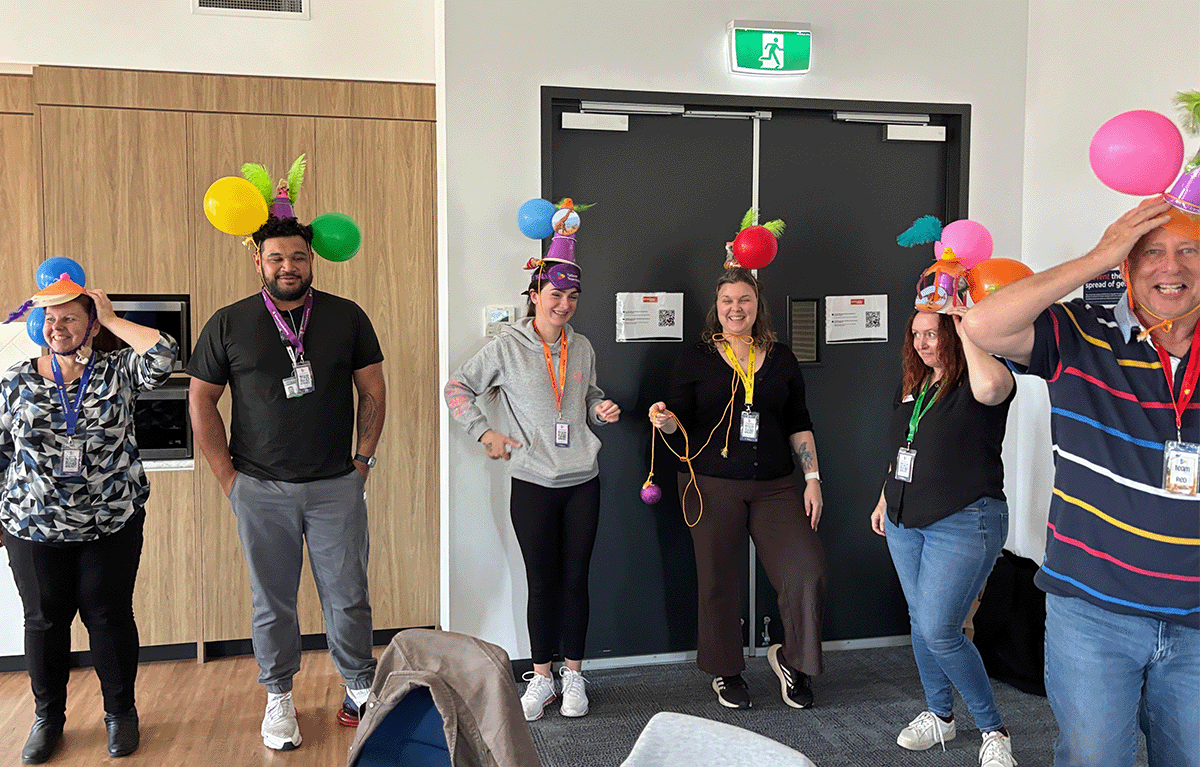 Salvation Army staff completing a team challenge during their Canberra conference