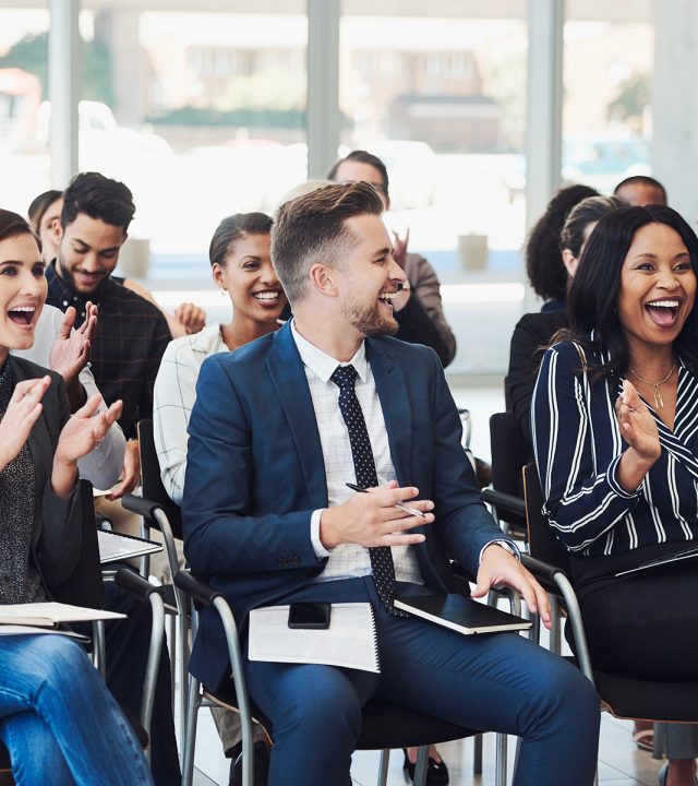 Tailored conference setup with branded signage and modern styling