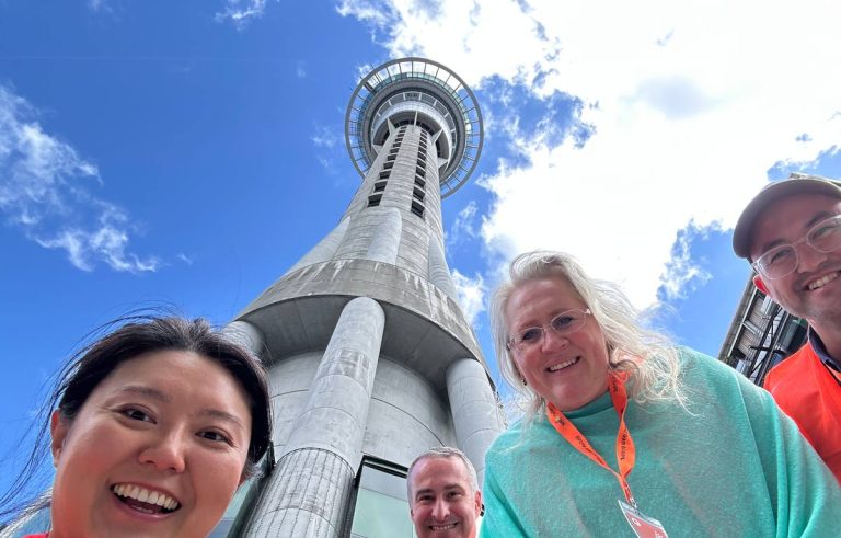 Employees completing a clue during team building activities in Auckland, New Zealand
