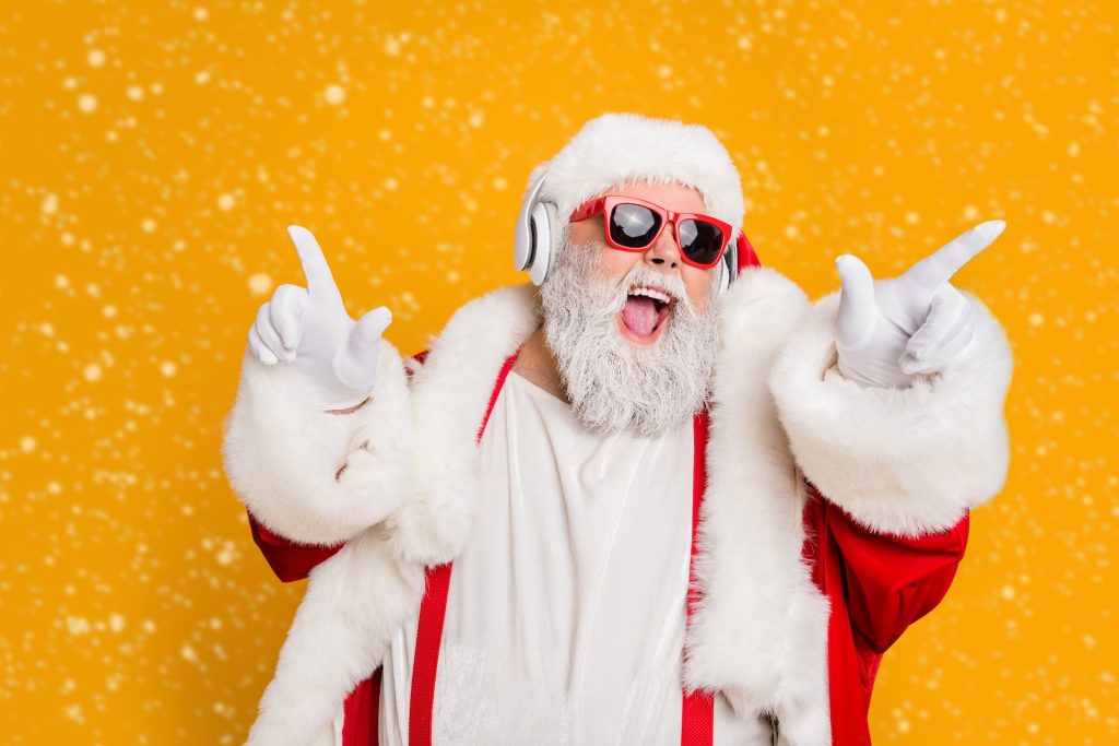 Santa celebrating his work Christmas Party that he booked through Tailored Team Building