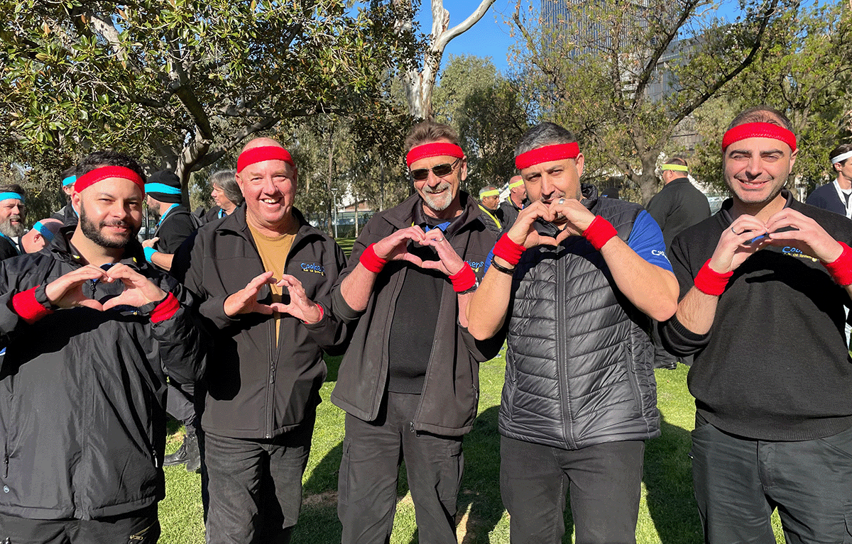 Teams having fun during a popular team building activity with Tailored Team Building