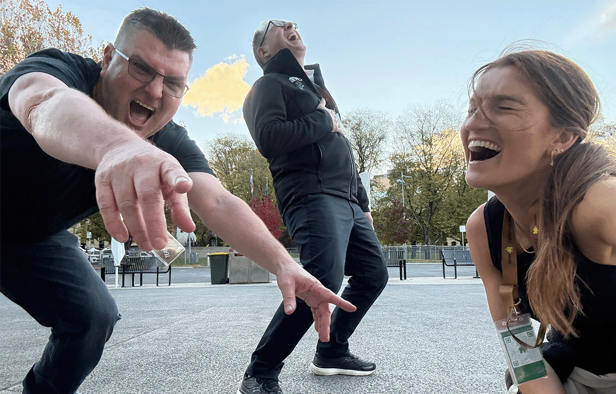 Teams having fun during a popular team building activity with Tailored Team Building