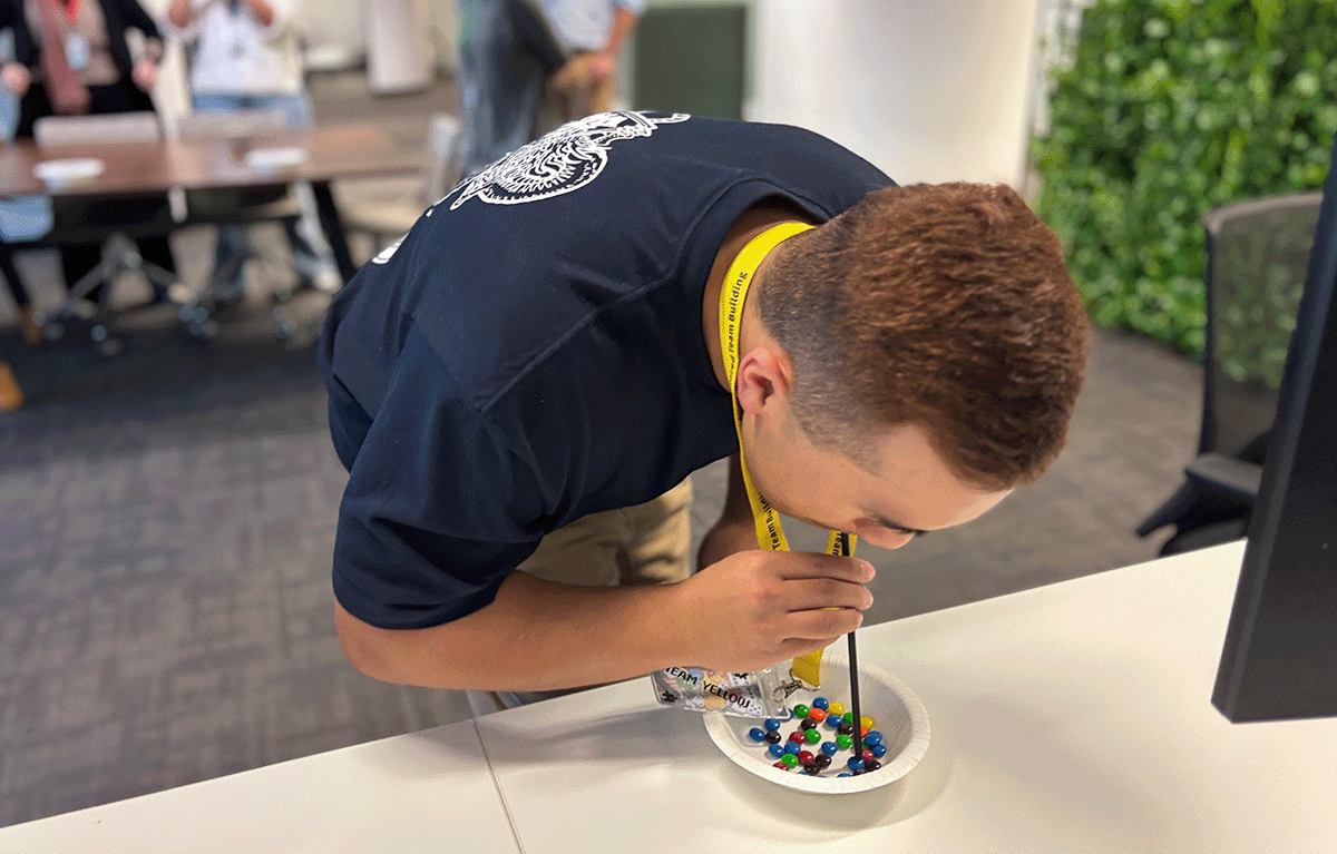 Contestants competing in a fun, high-energy team bonding Game Show activity