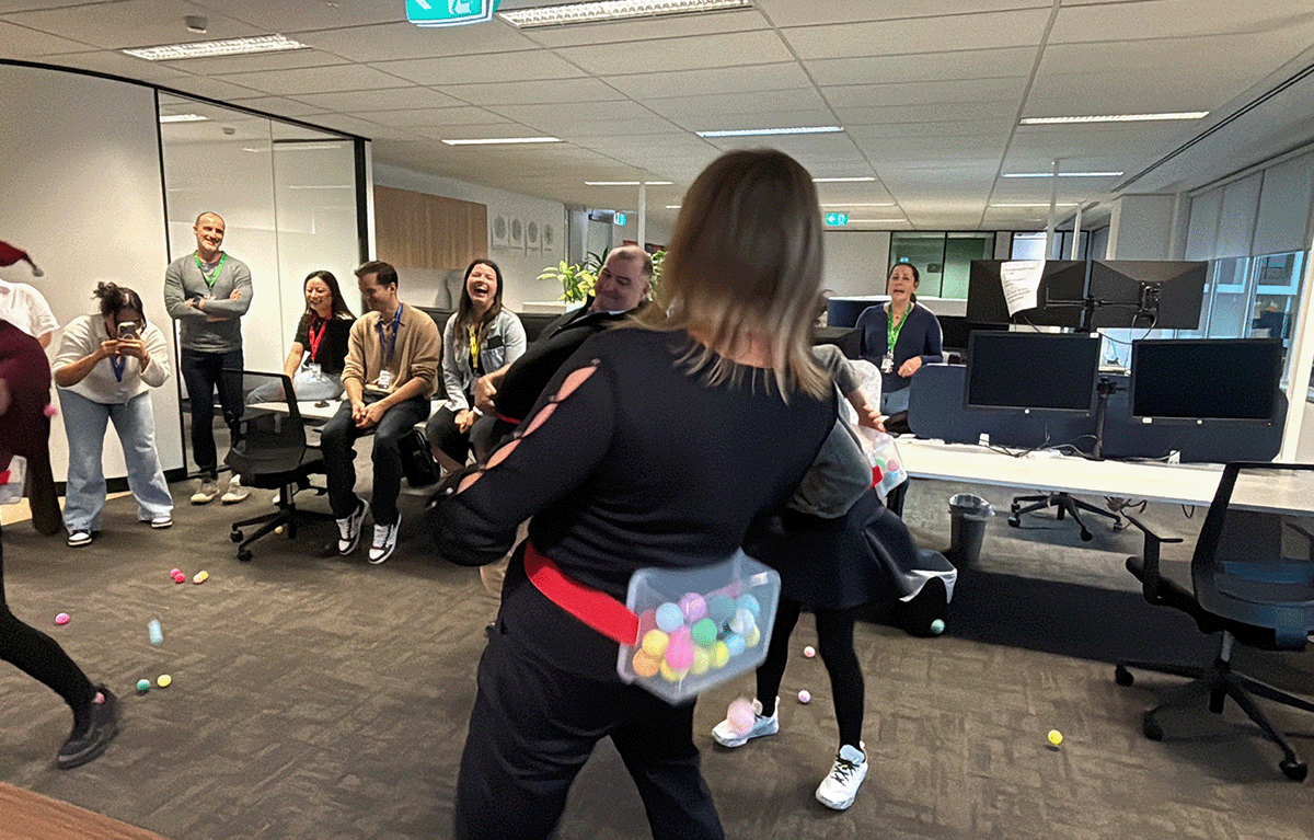 Contestants competing in a fun, high-energy team bonding Game Show activity