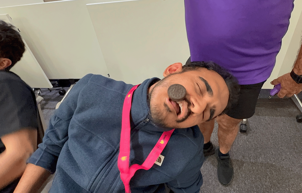 Contestants competing in a fun, high-energy team bonding Game Show activity