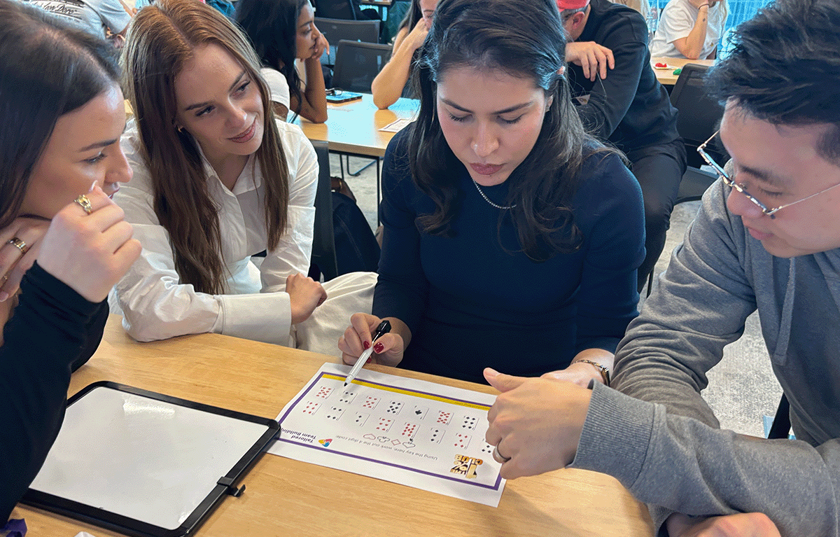 Contestants competing in a fun, high-energy team bonding Game Show activity