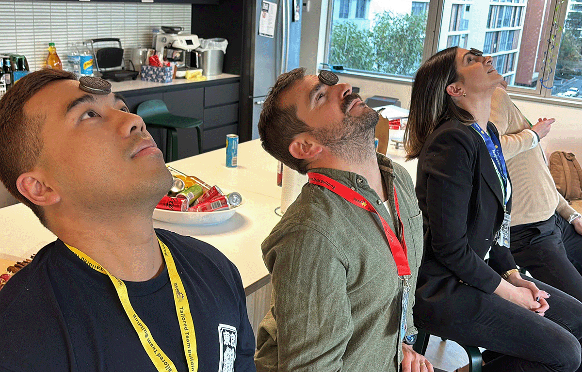 Contestants competing in a fun, high-energy team bonding Game Show activity