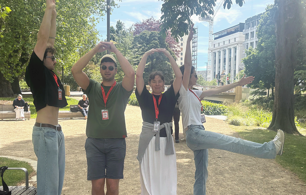 Teams spelling out LOVE on a team challenge on the amazing race