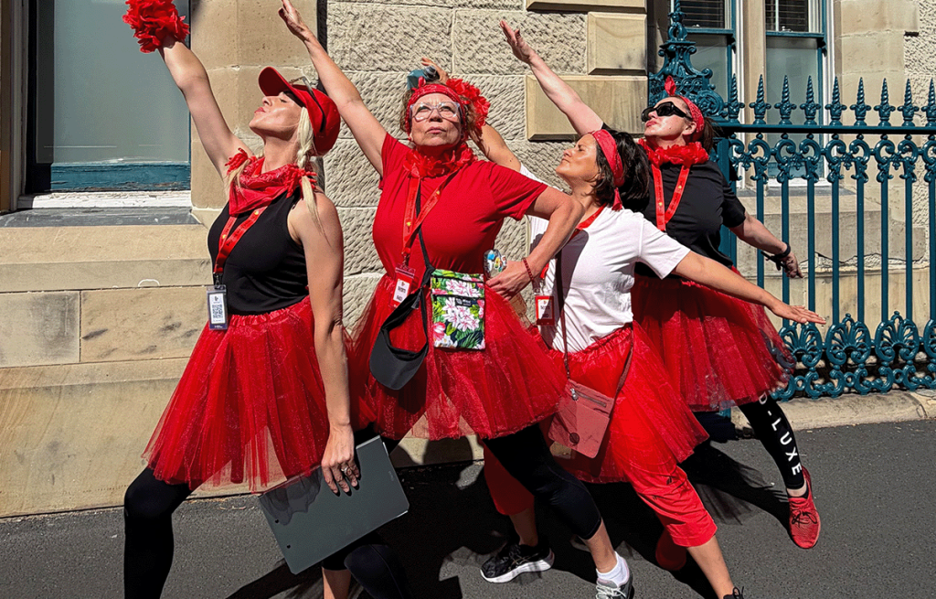 Outdoor team building activities in Hobart with teams solving clues near the harbour