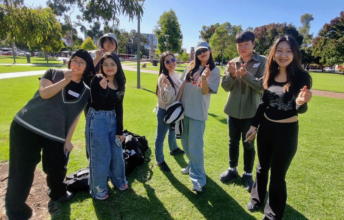Team building activity in Christchurch with group completing outdoor challenge