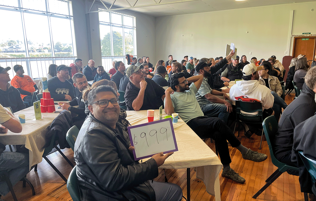 Large group team bonding event in Taumarunui with 24 teams competing in interactive Game Show challenges.