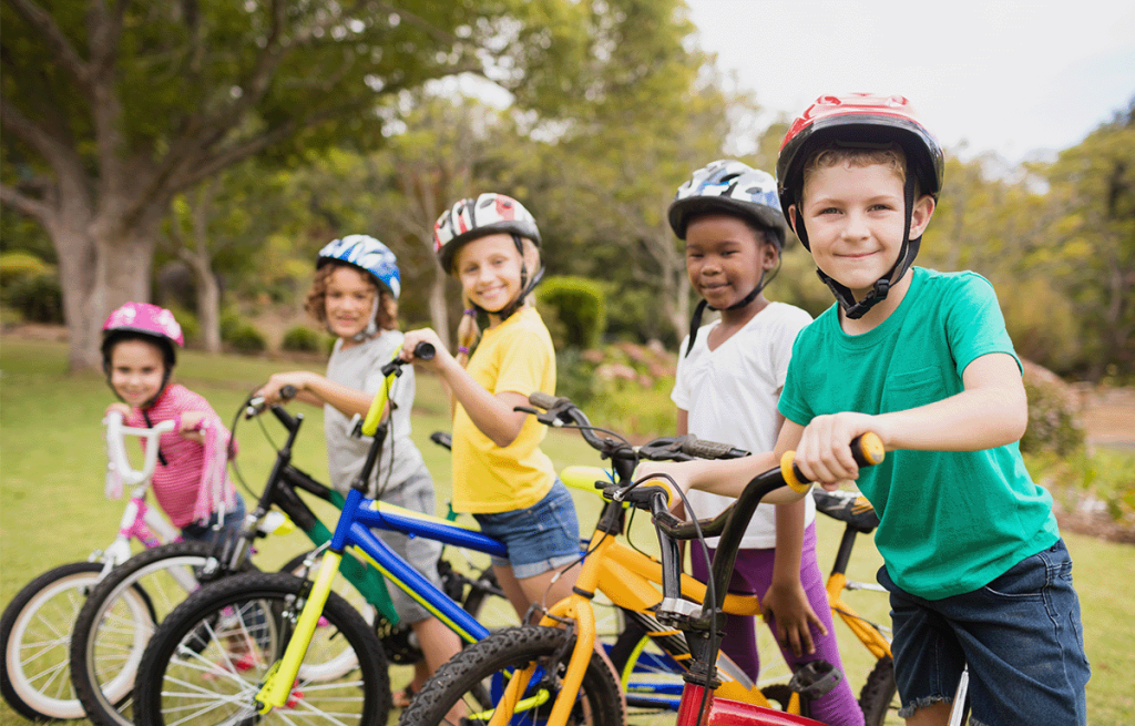 Kids smiling after our build a bike challenge