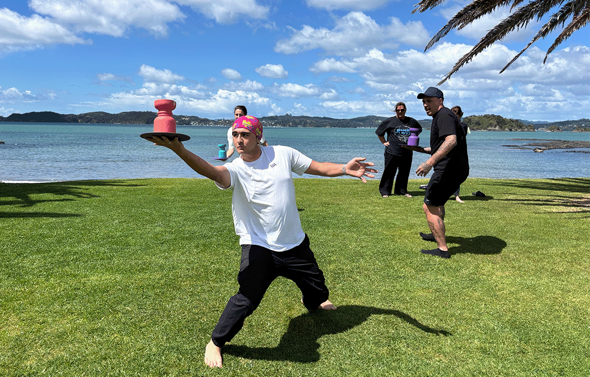 Outdoor team building in New Zealand featuring fun and competitive Survivor-inspired activities.