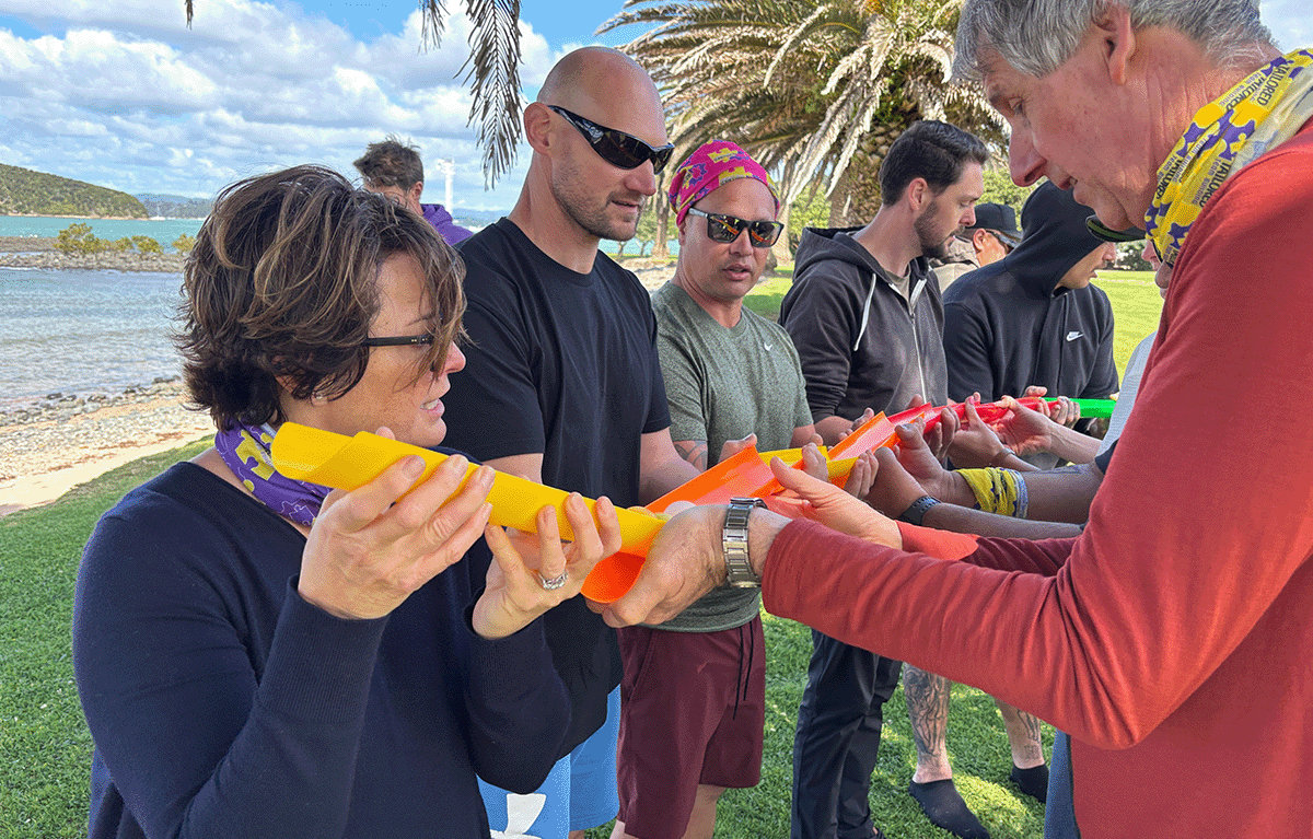 Sixteen participants coming together for the ultimate pipeline teamwork challenge in New Zealand