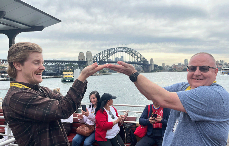 Corporate team laughing together during fun team bonding activity in Sydney