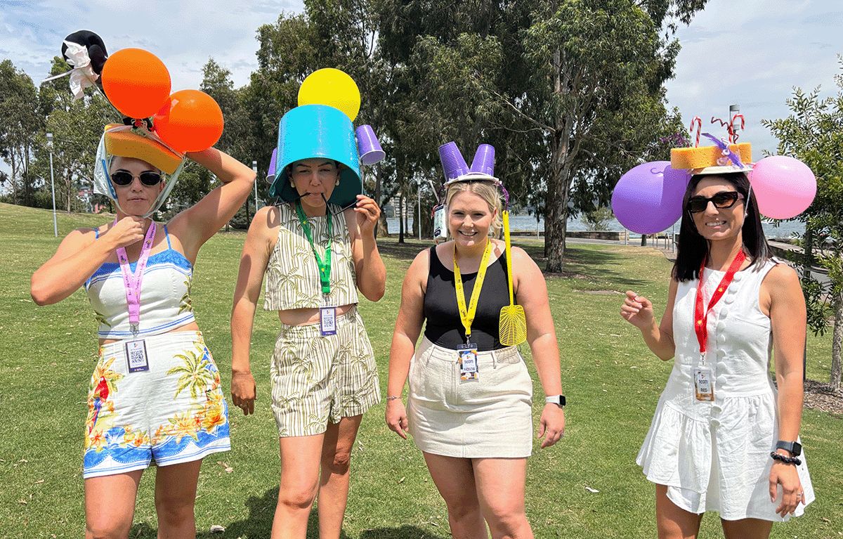 Group completing strategy task in Sydney outdoor team building event